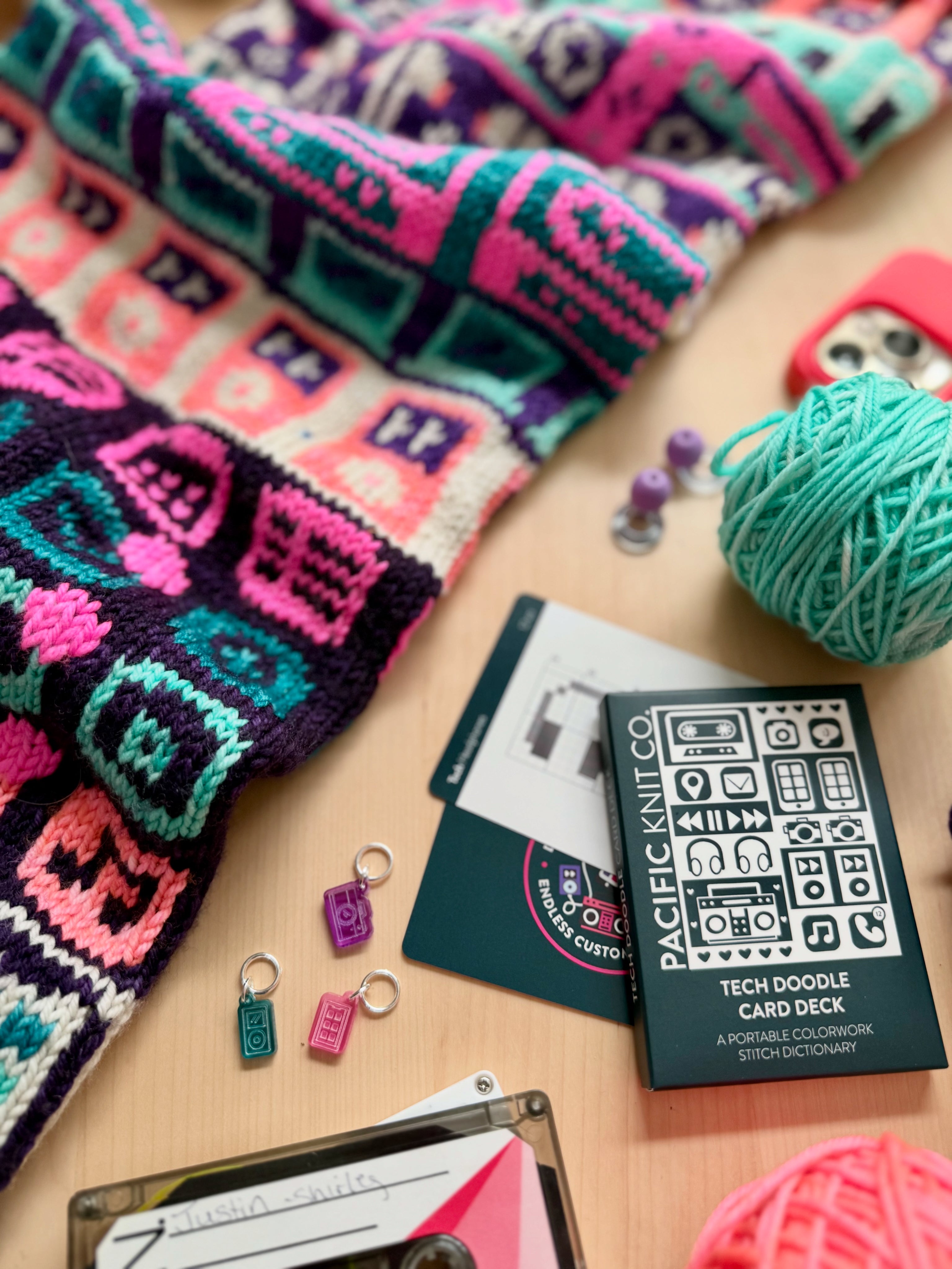Tech Doodle deck and stitch markers beside a neon gadget colorwork knit