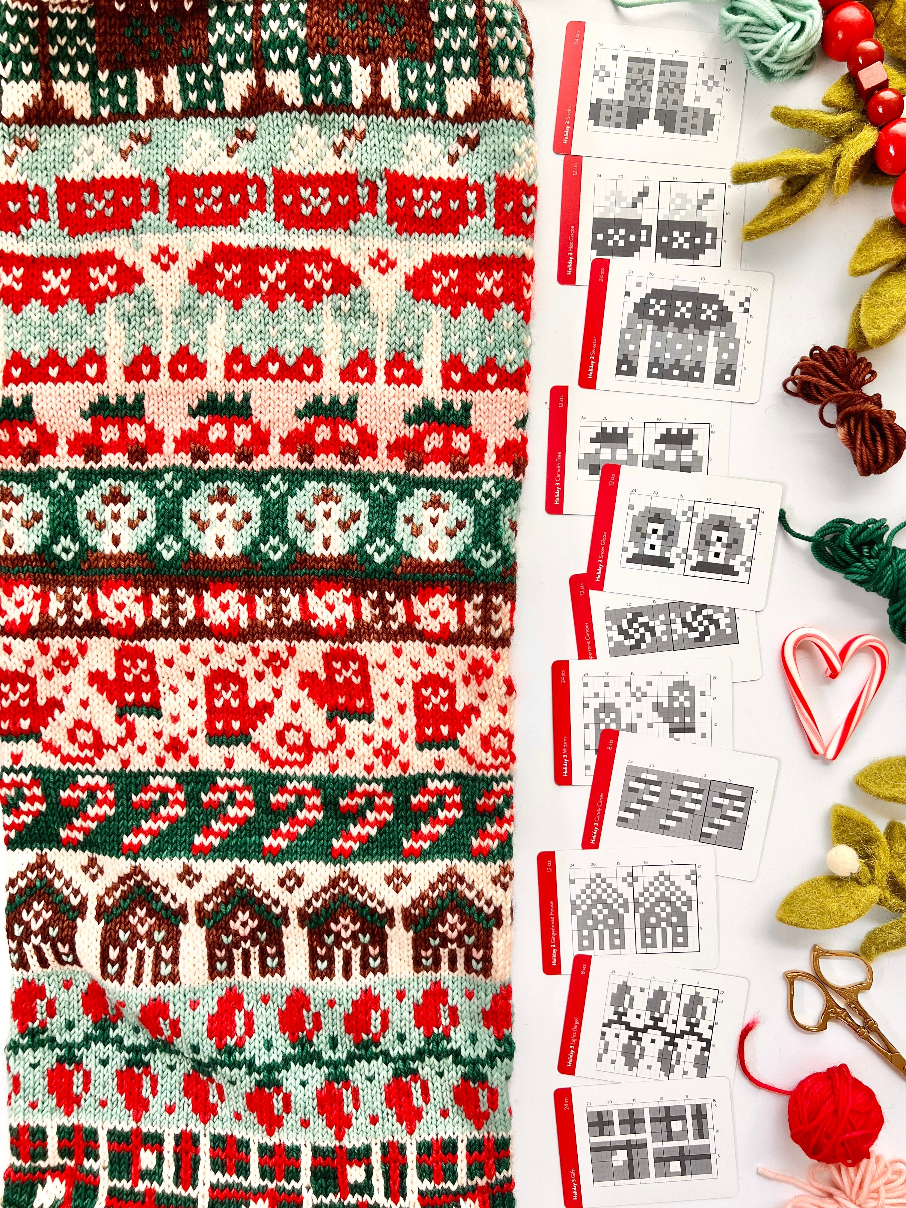 Holiday 3 Doodle chart cards beside a red and green gingerbread colorwork knit
