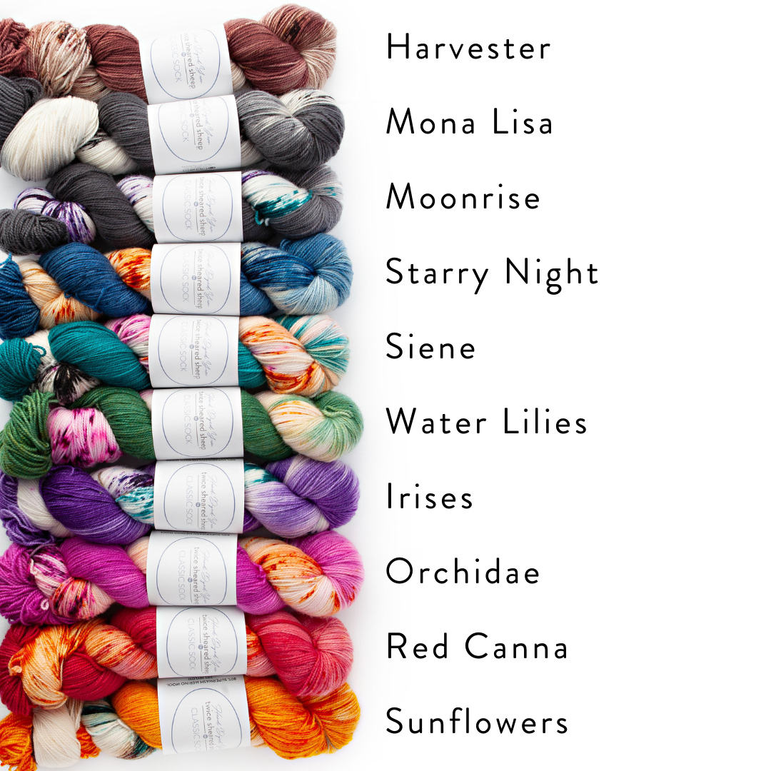 Ten skeins of TSS Classic Sock Paints yarn stacked horizontally with colorway names labeled Harvester and Mona Lisa and Moonrise and Starry Night and Siene and Water Lilies and Irises and Orchidae and Red Canna and Sunflowers showing the full range of hand-dyed variegated colorways