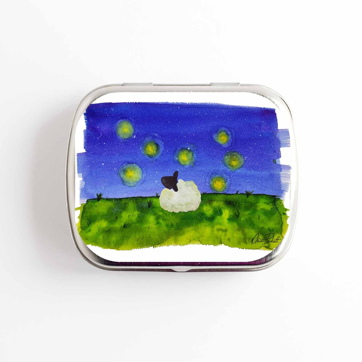 Small hinge-style silver storage tin with the Firefly Dreams watercolor scene of a sheep watching fireflies on a starry night, signed by Dawn Prickett