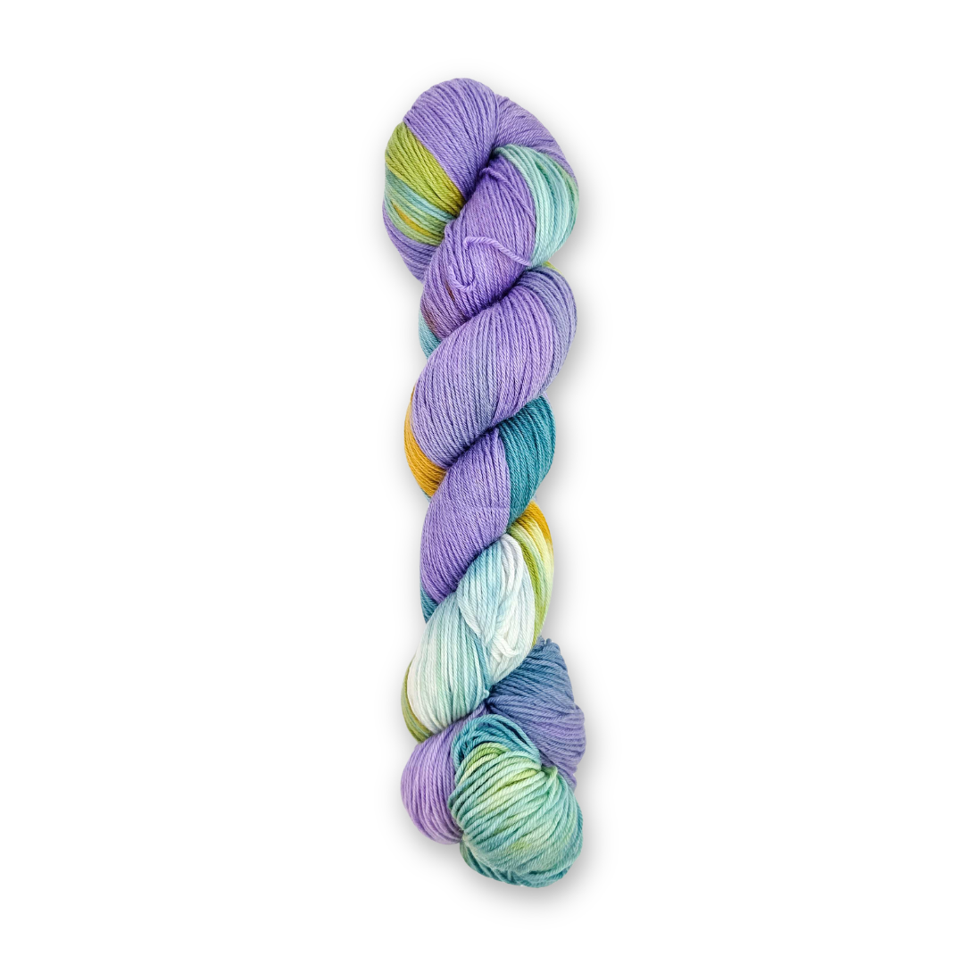 Molly Klein Design Cove fingering weight sock yarn skein in speckled lavender, teal and gold