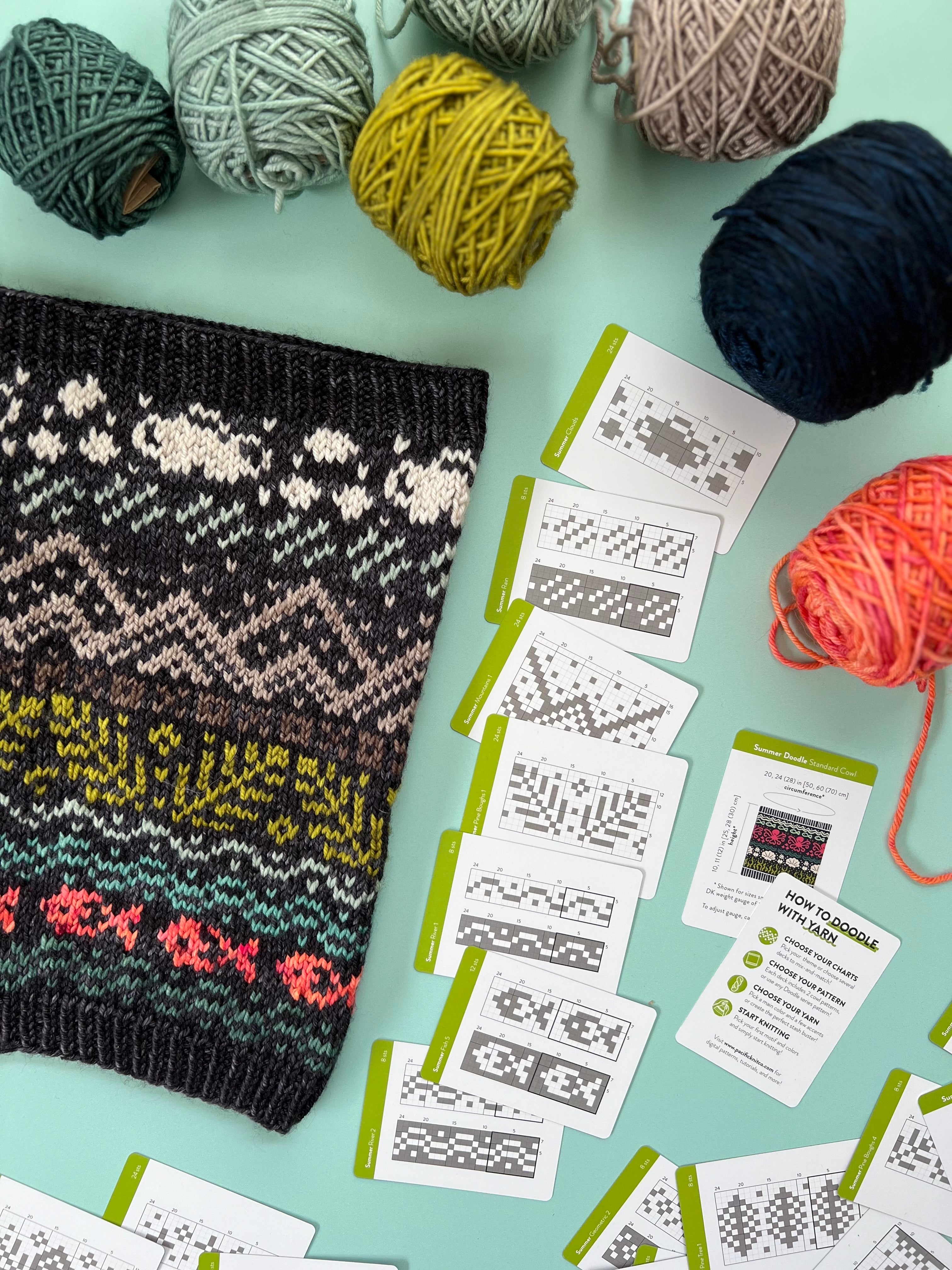 Dark Summer Doodle colorwork knit with sea life charts and cards on a mint background