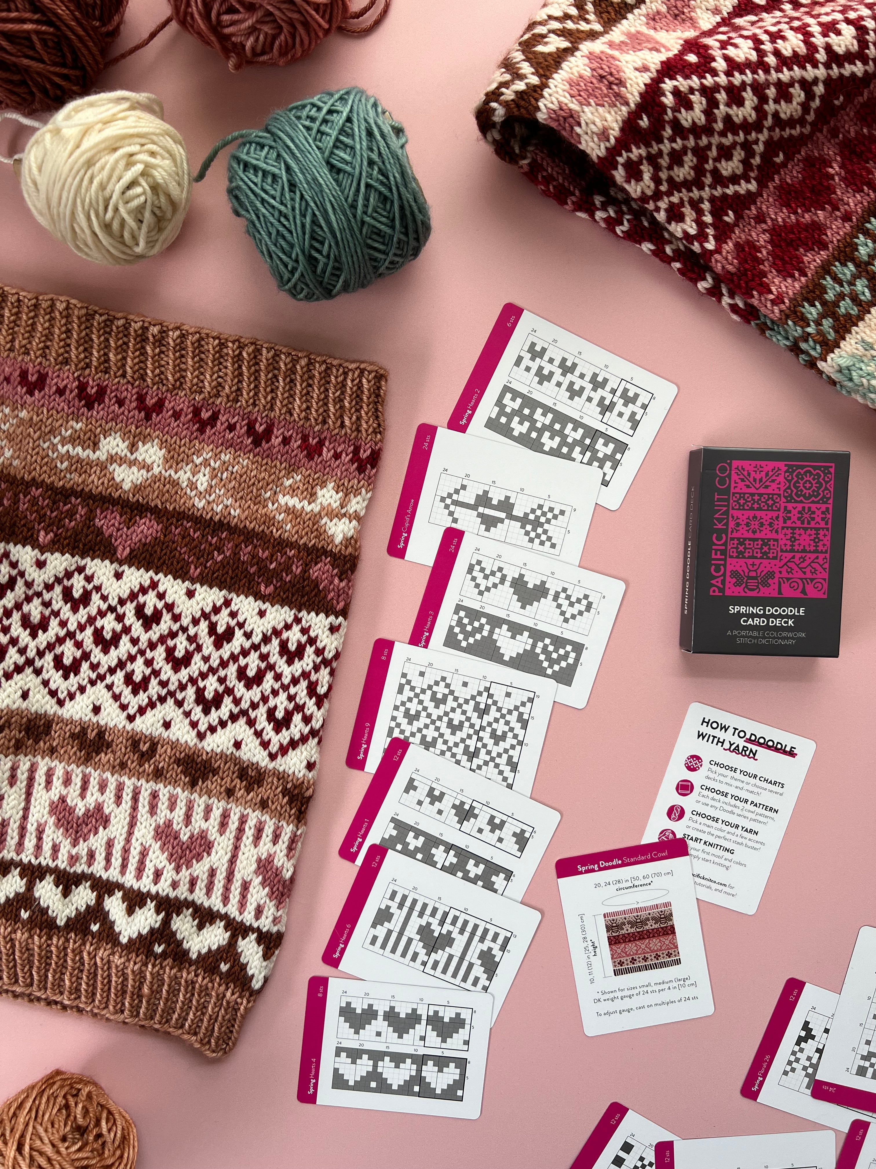 Spring Doodle colorwork knit in burgundy and cream with chart cards and deck