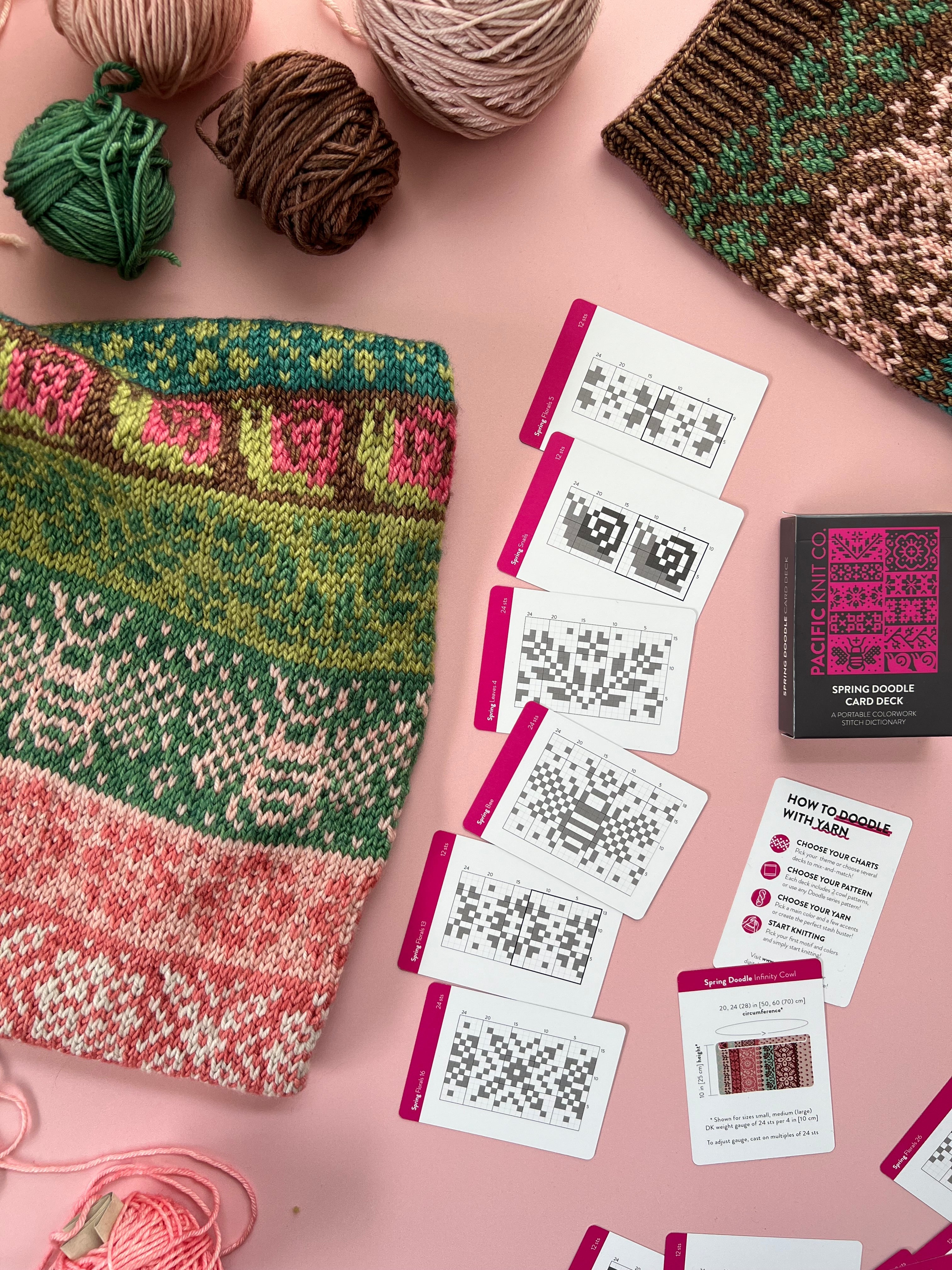 Green and pink Spring Doodle colorwork knit with chart cards and deck