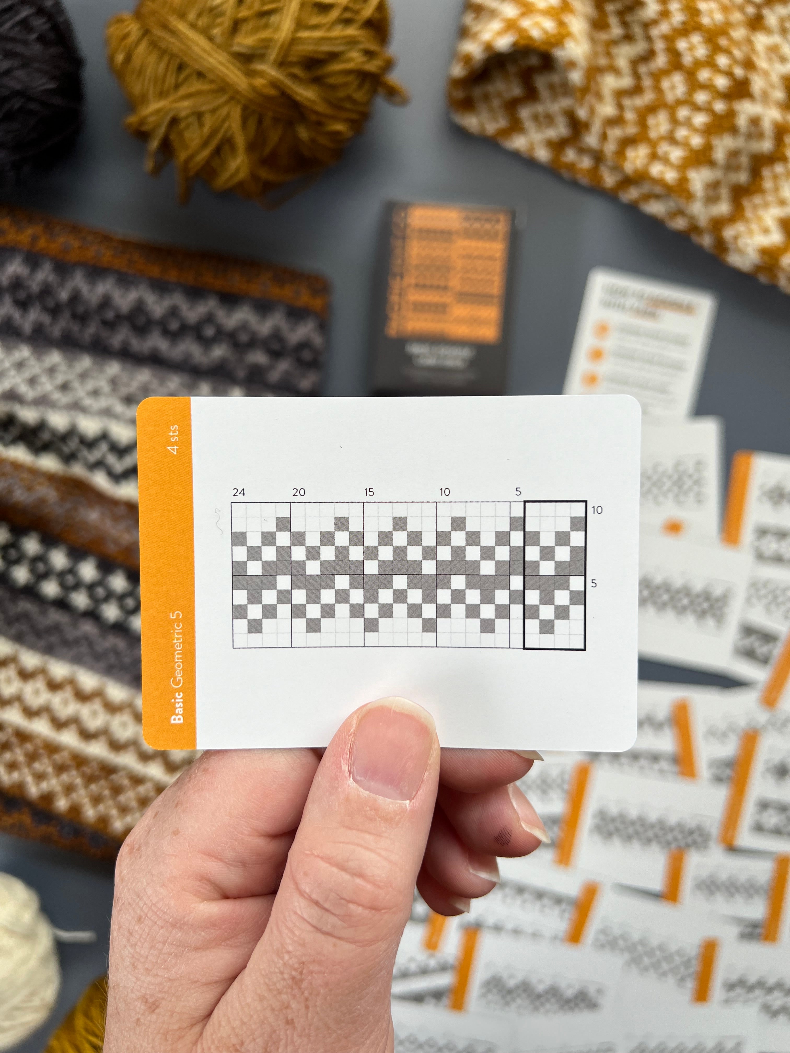 Hand holding a Basic Doodle stacked squares chart card