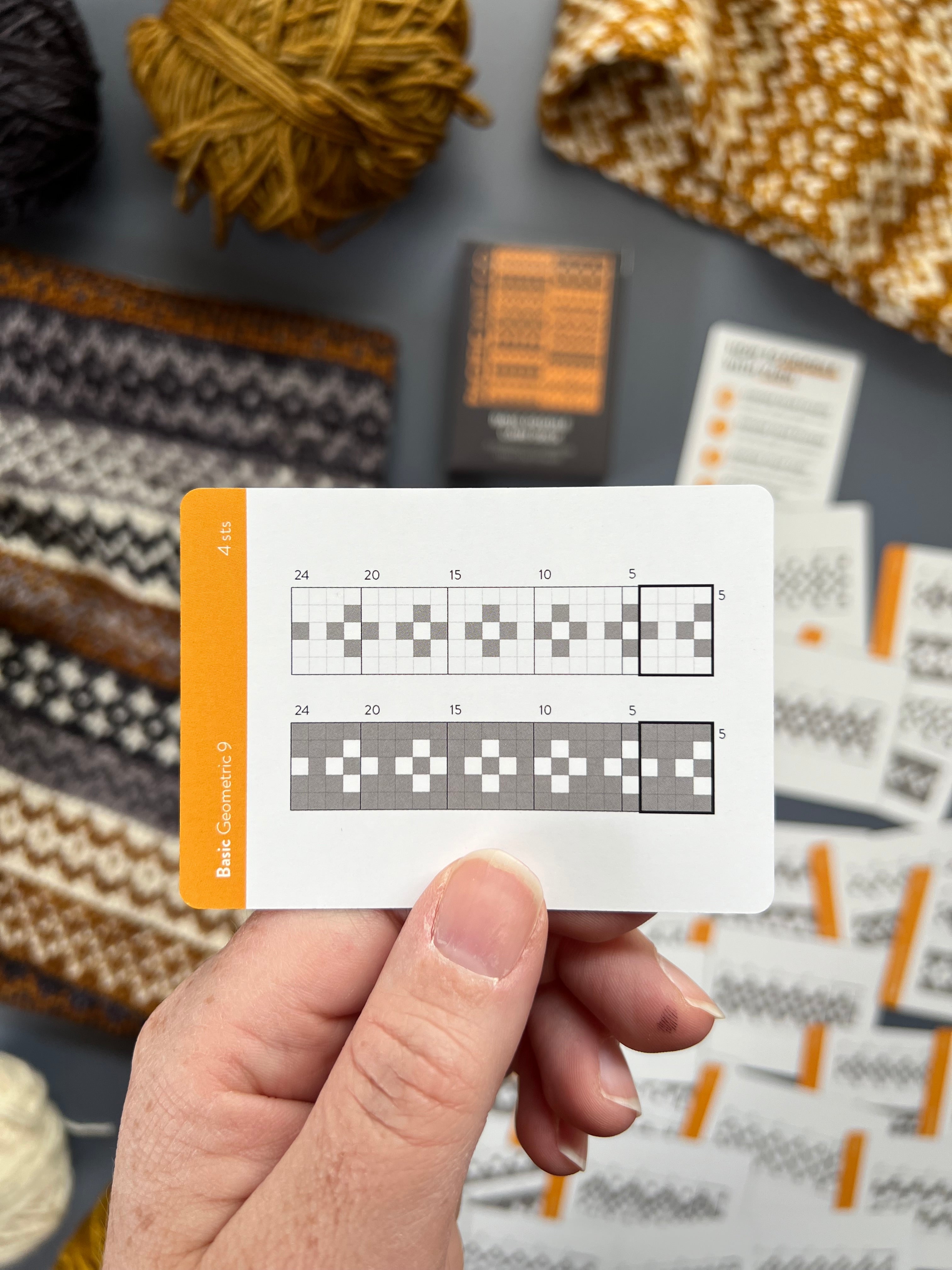 Hand holding a Basic Doodle geometric repeat chart card
