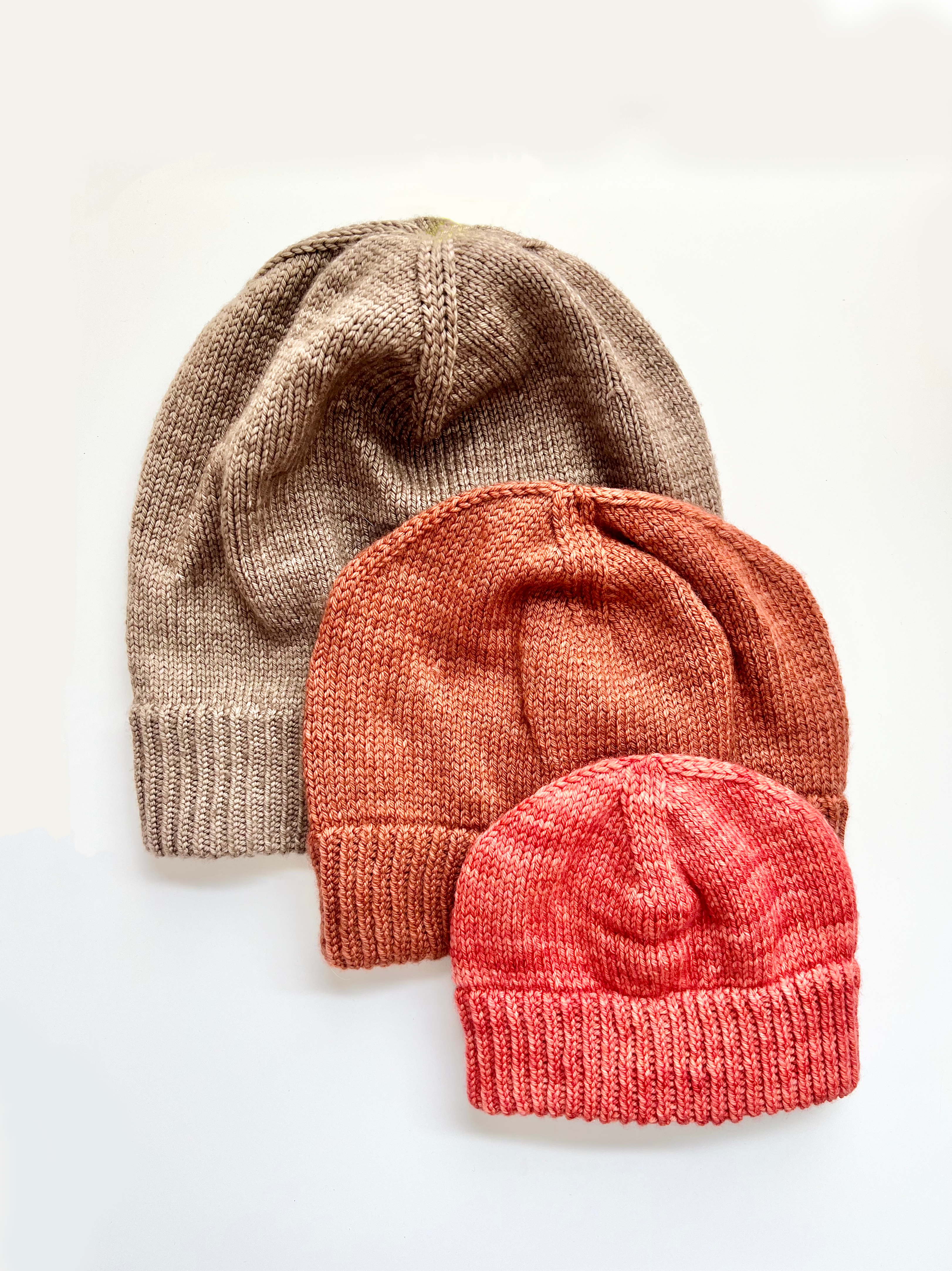 Three Base Doodle Beanie 2 hats in tan, rust and coral with folded brims